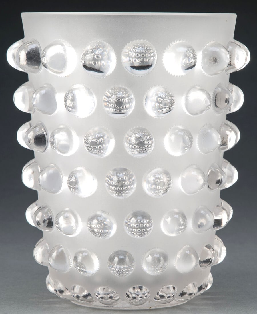R. Lalique Clear and Frosted Glass Mossi Vase: R. Lalique Clear and Frosted Glass Mossi Vase Marks: LALIQUE FRANCE Dimensions: 7-7/8 inches (20 cm) M. p. 457, no. 1088 Composition: crystal Hand wash Made in France The Mossi Vase is both a stroke o