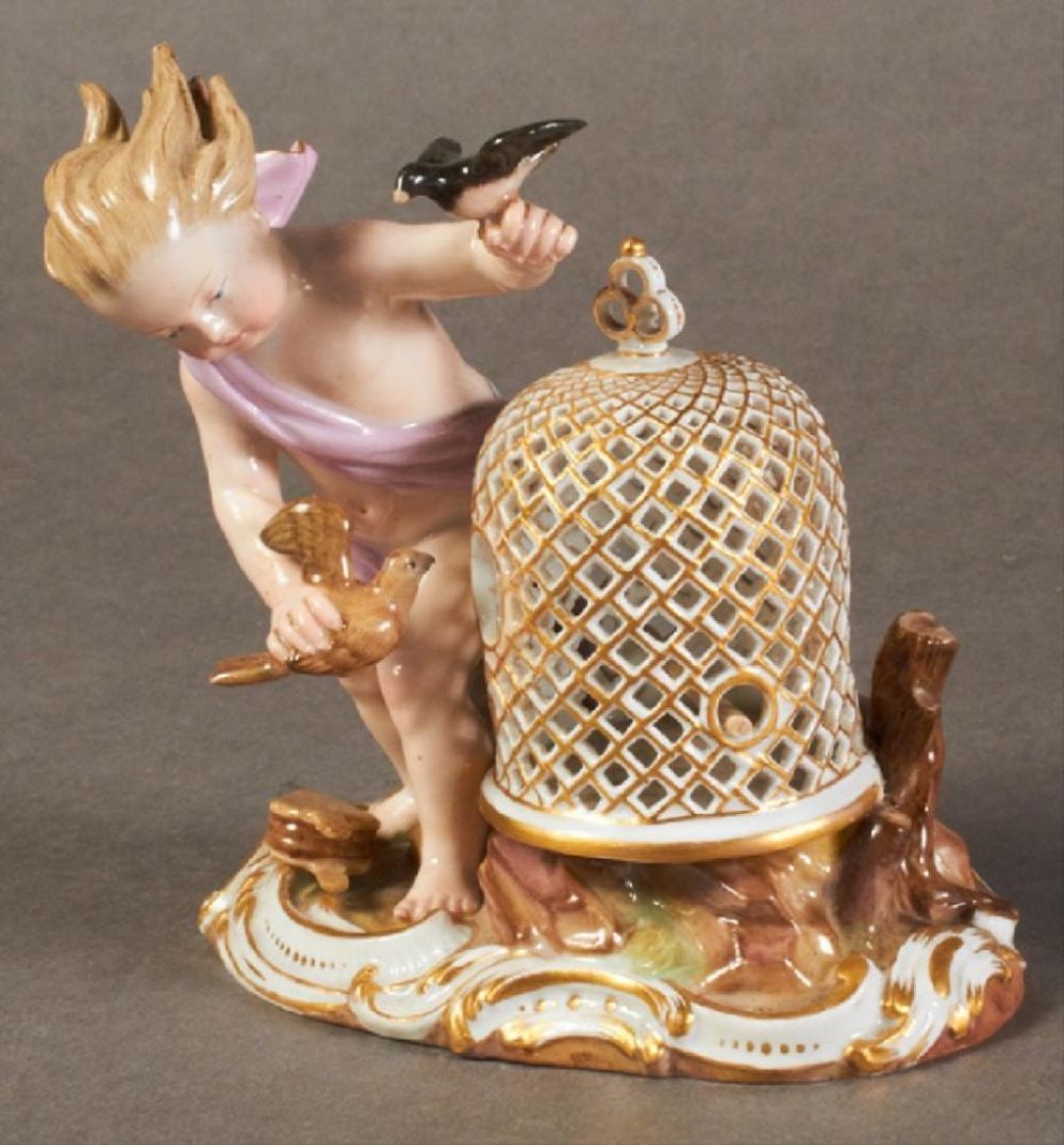 19Th C. Meissen Figure Of Bird Cage: 19Th C. Meissen Figure Of Bird Cage . Meissen Porcelain Figural Group, Late 19Th C., Of A Putto With Birds And A Bird Cage, On A Relief Base With A Bellows, The Underside Impressed "146," With A Blue