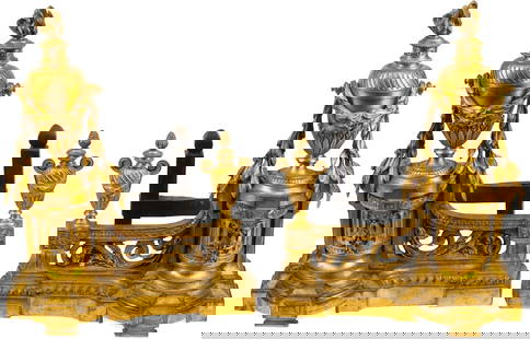 Pair of Louis XVI Style French Gilt Ormolu Bronze Rococo Iron Chenets Andirons: A pair of Louis XVI Style French Gilt Ormolu Bronze Rococo Iron Chenets AndironsA pair of Louis XVI-style gilt bronze and iron chenetscirca 1900height 13in (33cm); width 10 1/2in (26.5cm); depth 7