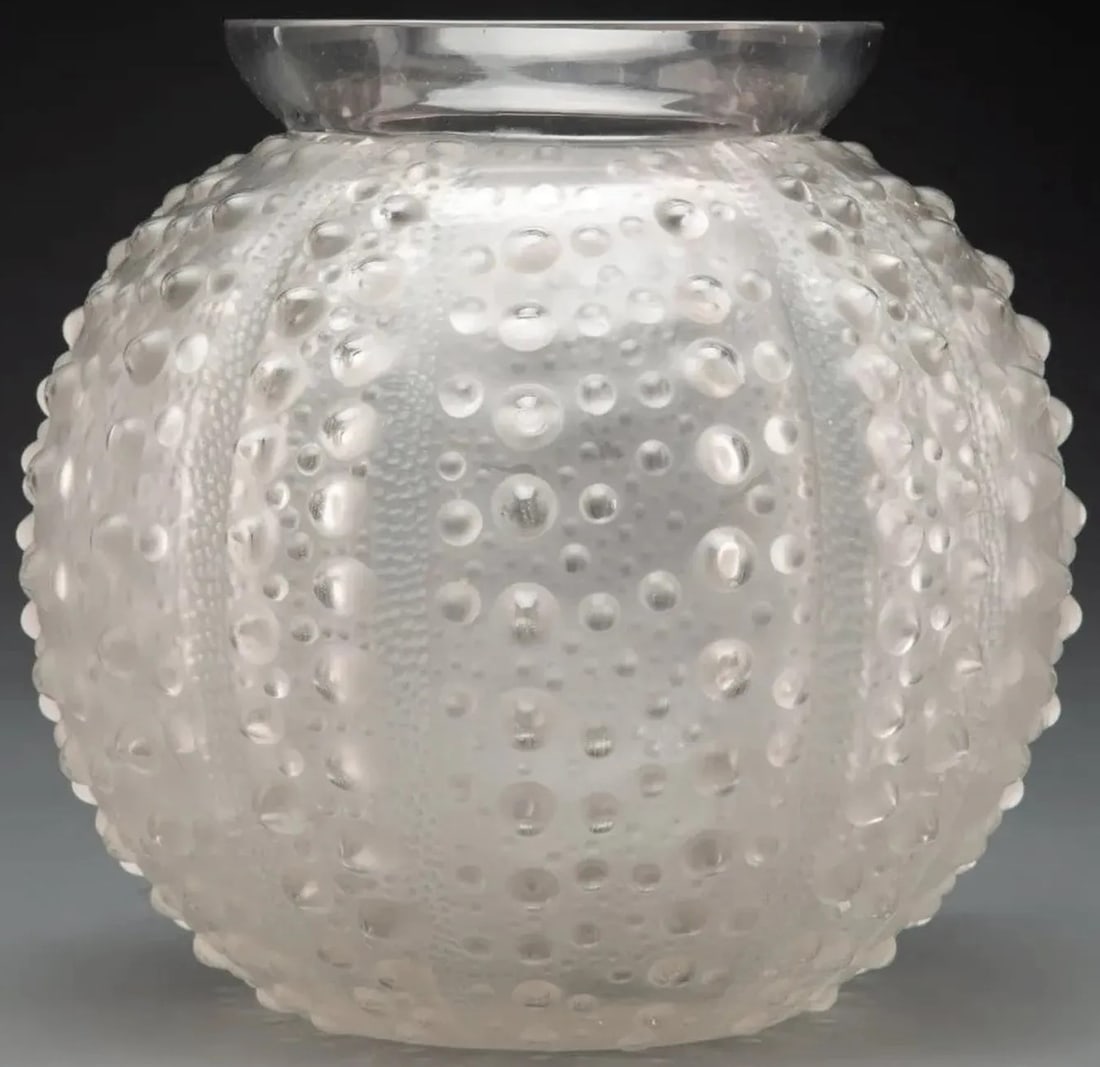 R. Lalique Clear and Frosted Glass Oursin Vase with Gray Patina Circa 1935: R. Lalique Clear and Frosted Glass Oursin Vase circa 1935 Spherical with everted rim, the body molded all over to resemble a sea urchin Marks: acid-stamped R. LALIQUE, FRANCE 18 M. p. 462, no. 10-888 