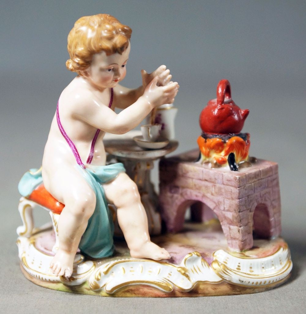 Meissen Cherub Figure Of Teamaker: 4.5" W 4" H 2.5" D Meissen porcelain or Meissen china was the first European hard-paste porcelain. Early experiments were done in 1708 by Ehrenfried Walther von Tschirnhaus. After his death that Octob