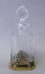 19TH CENTURY BACCARAT AND ENAMEL PERFUME BOTTLE: 19TH CENTURY BACCARAT AND ENAMEL PERFUME BOTTLE. MEASURES H: 6 3/4" W: 3"