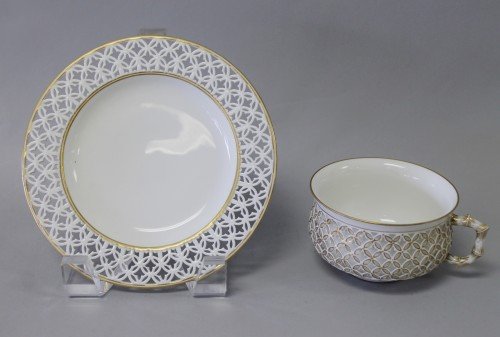 19TH CENTURY SEVRES CUP AND SAUCER: 19TH CENTURY SEVRES CUP AND SAUCER. THE CUP MEASURES H: 2" AND THE SAUCER MEASURES 5 3/4" DIAMETER