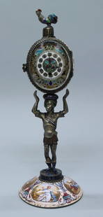 VIENNESE ENAMEL CLOCK ON SILVER: VIENNESE ENAMEL CLOCK ON SILVER. MEASURES H: 7 1/4" W: 2 3/4"