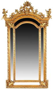 Large 94.5" Antique French Gilt Wood Carved Wall or Console Mirror Cherub Floral Decorated: Large 94.5" Antique French Gilt Wood Carved Wall or Console Mirror Cherub Floral Decorated the arched surround surmounted by a pierced crest flanked by two cherubs, and enclosing marginal mirror plate