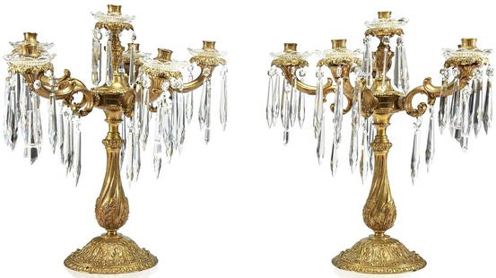 A large pair of Louis XV-style gilt-bronze and cut glass six-light candelabra: A large pair of Louis XV-style gilt-bronze and cut glass six-light candelabra Late 19th/early 20th century H: 23, Dia: 20 1/2 in. (approx) PROVENANCE: Private collection, Fort Washington, PA.
