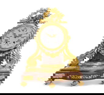 A French Red Rouge Marble And Gilt-Bronze Clock: Fourth-quarter 19th Century Stamped to mechanism: 2111 / ND The rouge marble base with bronze bow and arrow, laurel wreath, and torch over a white dial with Roman and Arabic numeral markers and bronze