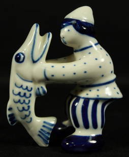 Russian Porcelain Figure Of Man With Fish: Russian Porcelain Figure Of Man With Fish. Measures H: 3 1/4" W: 3" The Imperial Porcelain Factory , also known as the Imperial Porcelain Manufactory (abbreviated as IPM), is a producer of