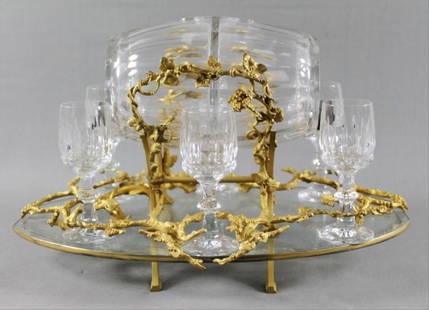 Gilt Bronze And Baccarat Crystal Liquor Set: Gilt Bronze And Baccarat Crystal Liquor Set. Measures 15 1/2" X 10" X 9 1/2" Baccarat Crystal is a French manufacturer of fine crystal glassware located in Baccarat, France. The company owns two museu