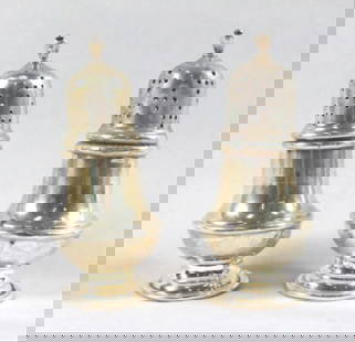 Pair Of Sterling Silver Salt Shakers: Pair Of Sterling Silver Salt Shakers. Measures H: 4 1/2" W: 1 1/2". Total Weight Is 68 Grams