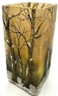 Daum Nancy Winter Scene Tree Tall Glass Vase: Daum Nancy Winter Scene Tree Tall Glass Vase Daum Nancy Tree Tall from a cameo glass vase in orange glass with a winter scene of a snow-covered forest signed Daum Nancy 4 3/4" ht. CONDITION: small fla