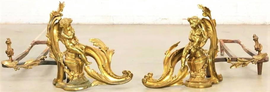 Pair of Antique 19th C. French Louis XV Style Gilt Bronze Putto Figural Fireplace Chenets: Pair of Antique 19th C. French Louis XV Style Gilt Bronze Putto Figural Fireplace Chenets A pair of Louis XV Style Gilt Bronze Figural Chenets 19th century Dimension: Height of Chenets 14 1/4in (36cm)
