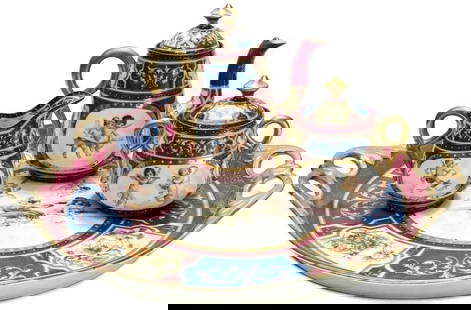 Antique Circa 1920 Royal Vienna Austria Partial Tea Service Set: Antique Circa 1920 Royal Vienna Austria Partial Tea Service SetRoyal Vienna Austria tea service. A red, white, and blue wine ground with hand-painted cherubs to the central areas and gilt to the