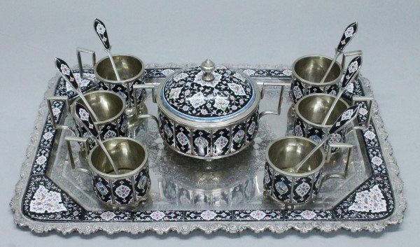 PERSIAN SILVER ENAMEL TEA SET: PERSIAN SILVER ENAMEL TEA SET WITH 6 MATCHING SPOONS. THE SUGAR POT MEASURES H: 4" THE CUPS MEASURE H: 2 1/2" AND THE TRAY MEASURES 10" X 14".