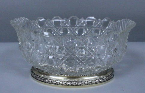 BACCARAT CUT GLASS AND STERLING BOWL WITH BASE: BACCARAT CUT GLASS AND STERLING BOWL WITH BASE. MEASURES 4 1/4" X 9". NO INTERNATIONAL SHIPPING ON IVORY