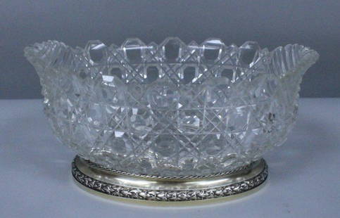 BACCARAT CUT GLASS AND STERLING BOWL WITH BASE: BACCARAT CUT GLASS AND STERLING BOWL WITH BASE. MEASURES 4 1/4" X 9". NO INTERNATIONAL SHIPPING ON IVORY