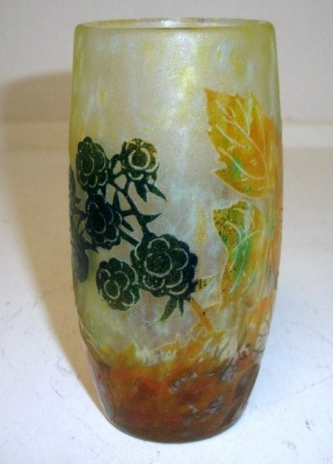 A Beautiful Daum Nancy Cameo glass vase: A Beautiful Daum Nancy Cameo glass vase. Measures 5 3/4" tall with 3 colors of flowers including black. NO INTERNATIONAL SHIPPING ON IVORY