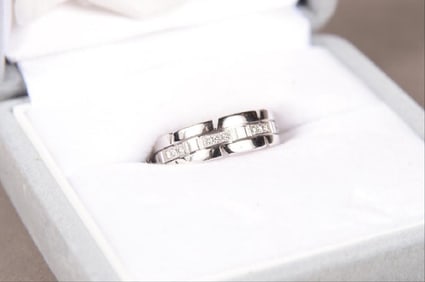 Cartier 18K Gold And Diamond Ring. Signed: Cartier