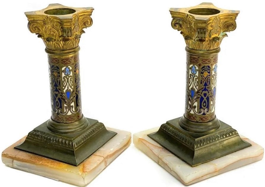 Pair of French Champleve Enamel Bronze Candlesticks, 19th Century: Pair of French Champleve Enamel Bronze Candlesticks, 19th Century Pair French Champleve enamel bronze column formed candlesticks, 19th Century. Multi-colored enamel designs to the column stem. Mounted