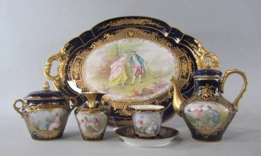 SEVRES PORCELAIN TEA SET: SEVRES PORCELAIN TEA SET. Artist signature illegible. 19th century. Tray measures 18 3/4" x 13 1/4" and tea pot 6 1/4" tall