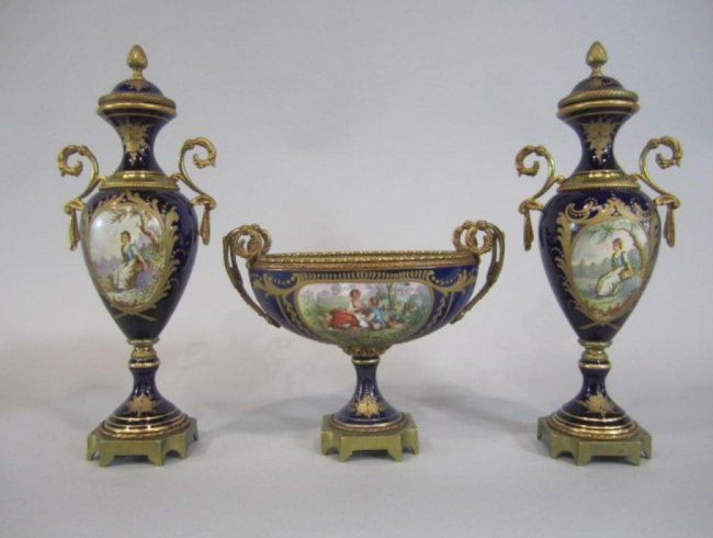 SEVRES & BRONZE ORMOLU 3PC GARNITURE SET: SEVRES & BRONZE ORMOLU 3PC GARNITURE SET. Bowl measure 7" tall and garnitures 12" tall