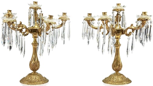 A large pair of Louis XV-style gilt-bronze and cut glass six-light candelabra