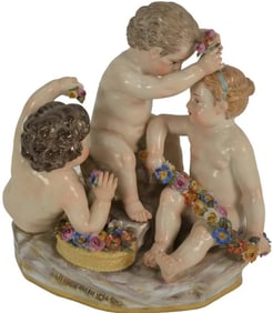 Meissen German Figural Group Having Three Cherub Puttis with Flowers