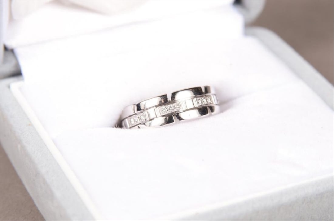 Cartier 18K Gold And Diamond Ring. Signed: Cartier: Cartier 18K Gold And Diamond Ring. Signed: Cartier .750. Serial Number: 0P2345. Size: 4Guaranteed 100% Authentic Cartier was born on 2 February 1884 in Paris. He was one of three sons of Alfred