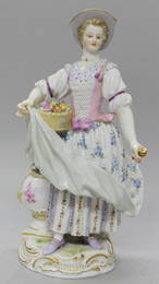 MEISSEN FIGURE OF WOMAN WITH FLOWERS