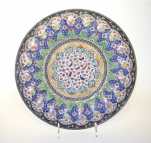 Enamel Charger Of Middle Eastern Origin: A 15" enamel charger or platter of Middle Eastern interest, with multi color design enameled onto a copper base. Decorated on both sides, with the bottom being white. Signed.