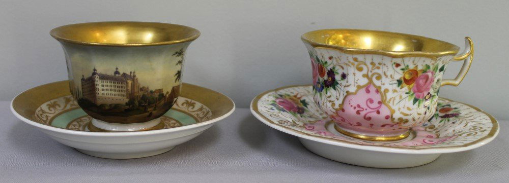 PAIR OF BERLIN KPM CUP AND SAUCERS: PAIR OF BERLIN KPM CUP AND SAUCERS. THE CUP MEASURES H: 3" W: 3 1/4"