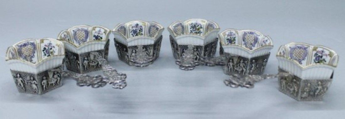 German sterling silver and Dresden porcelain dessert: German sterling silver and Dresden porcelain dessert serving dishes. It measures L: 6 1/2", the german sterling silver cup holders weigh a total of 380 grams.