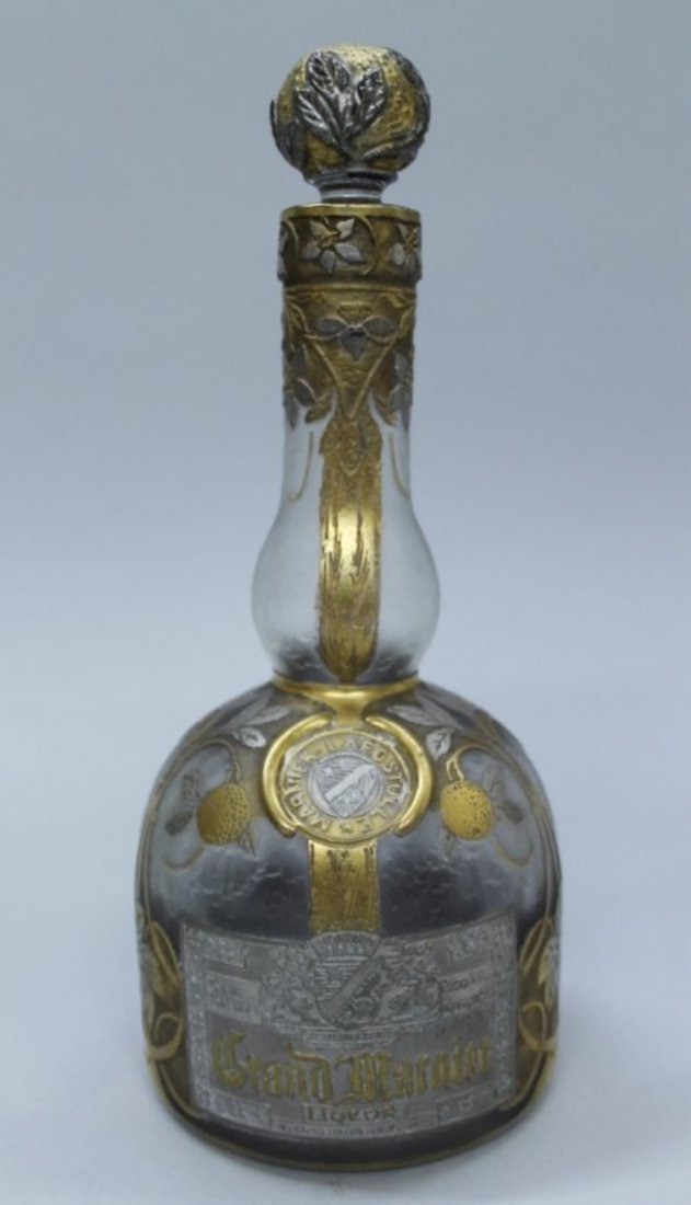 Daum Cameo Glass Grand Marnier Liquor Bottle: DAUM CAMEO GLASS GRAND MARNIER LIQUOR BOTTLE. MEASURES H: 8 1/2" W: 3 1/2".