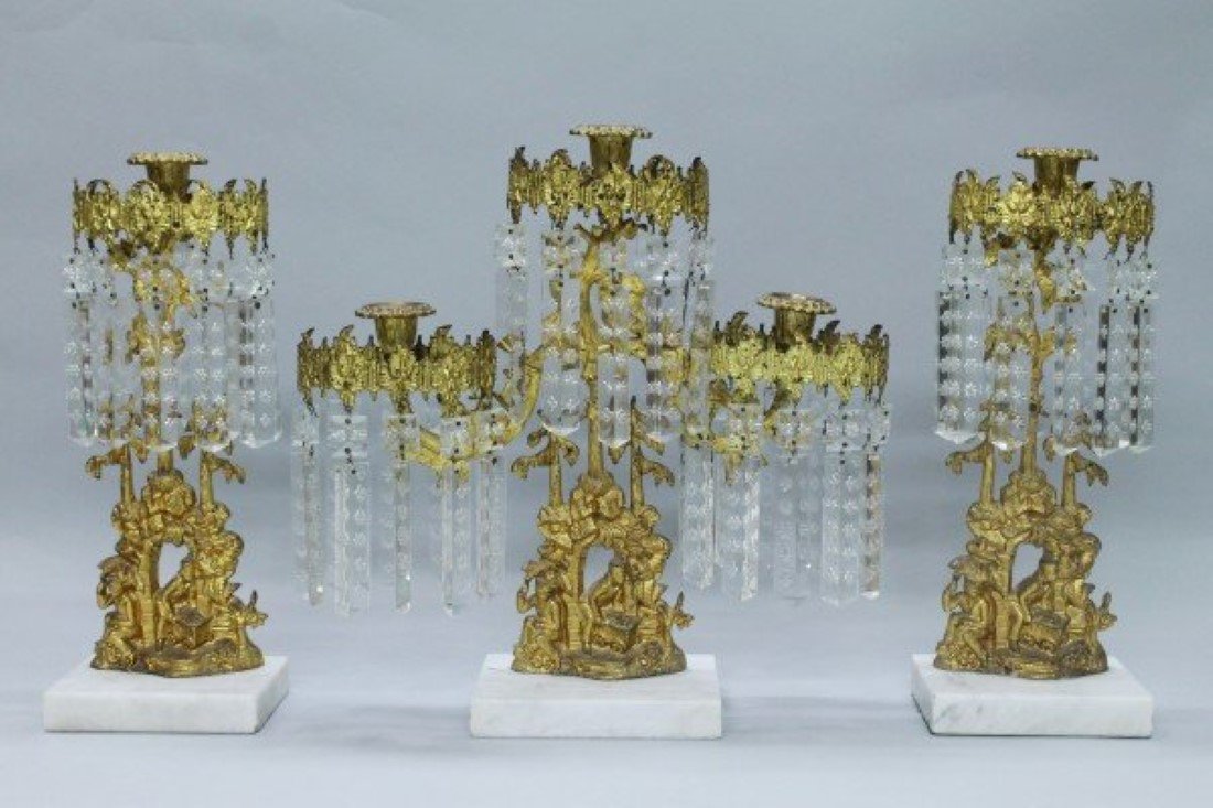 3 French Dore Bronze Candelabras: 3 French Dore Bronze Candelabras. The center pice measures H: 14 3/4" and the shorter one measures H: 14 1/4"