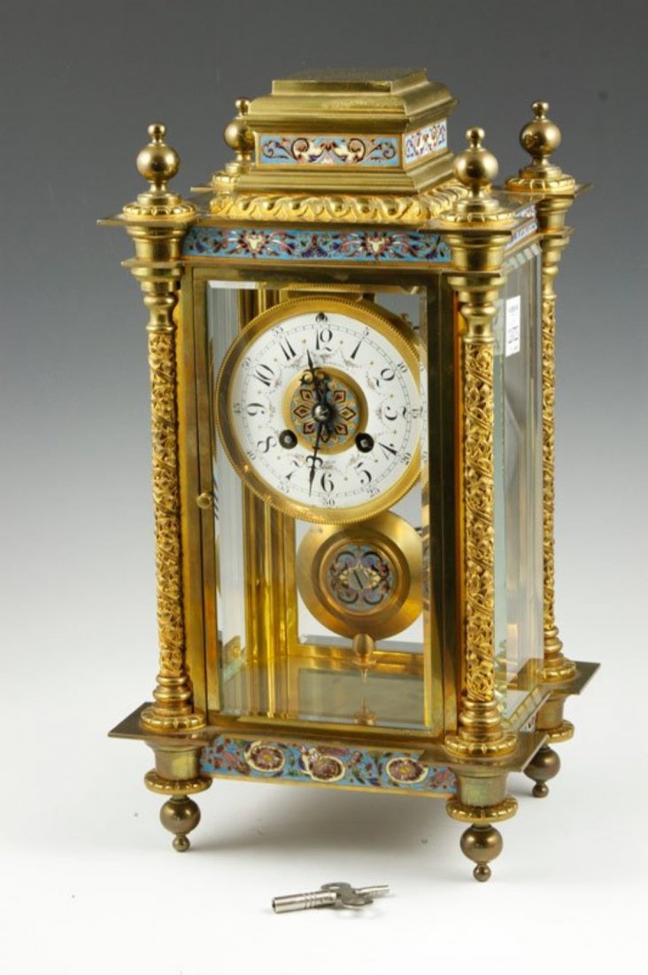 19th C. Champleve Mantle Clock: 19th century, champleve mantle clock, brass and beveled glass, key and pendulum included, marked Bigelow Kennard & Co, 14"h x 8"w x 7"d.