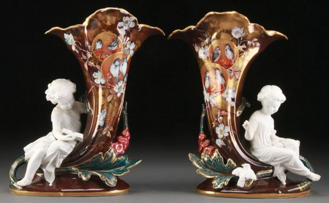 PAIR OF SAZERAT & BLONDEAU LIMOGES PARIAN FIGURAL VASES: A VERY FINE PAIR OF LEON SAZERAT AND P. BLONDEAU LIMOGES DECORATED AND PARIAN FIGURAL MANTLE VASES, CIRCA 1870. Of cornucopia form, finely decorated with birds in medallions and wild rose blossoms on 