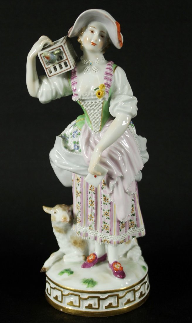 7 1/2" ANTIQUE MEISSEN GIRL WITH LAMB AND BIRDCAGE: 7 1/2" 19TH CENTURY AUTHENTIC ORIGINAL ANTIQUE MEISSEN GERMAN HAND PAINTED PORCELAIN FIGURE OF A YOUNG MAIDEN GIRL CARRYING A BIRDCAGE, LYING NEXT TO HER FEET IS A CUTE LITTLE BABY LAMB. THE BASE IS S
