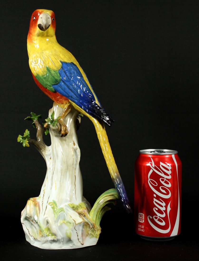 19th c. Meissen porcelain "Parrot on a Limb": Incised mark 63,12, blue cross sword mark. Approx. 12.75" H.