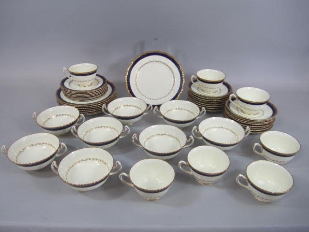 GROUP OF ROYAL DOULTON CHINA: GROUP OF ROYAL DOULTON CHINA. Including 8 salad plates, 16 bread plates, 8 saucers, 8 soup bowls, and 7 cups