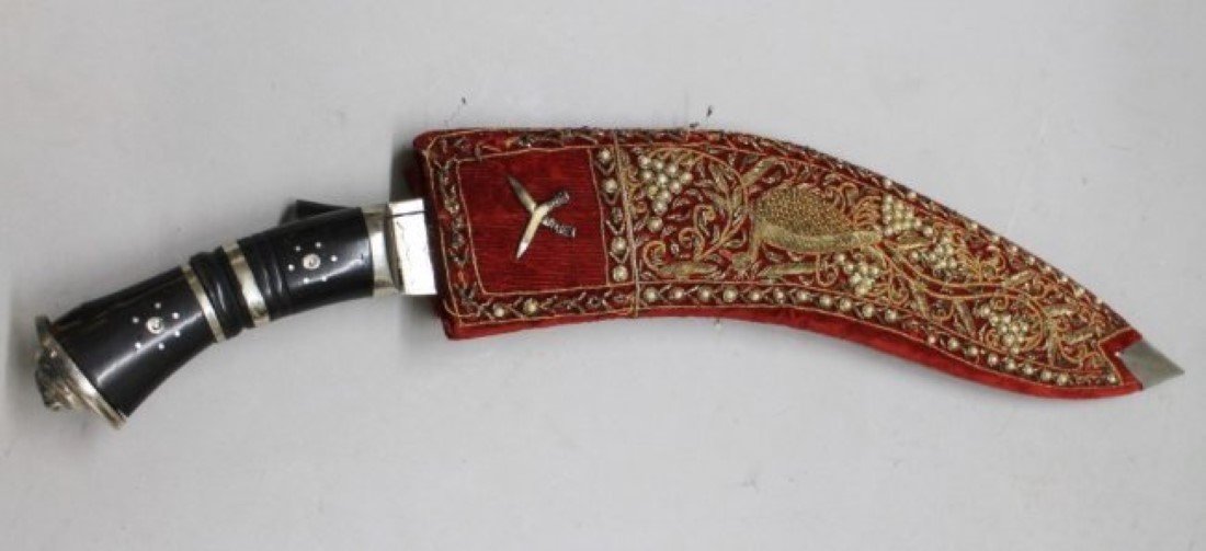 Indian Machete Knife, Khukuri style with Faux Pearl: Indian Machete Knife, Khukuri style with Faux Pearl Inlaid Velvet Sheath which Holds Smaller Knives (one of the smaller knives missing). Signed Engraved India on Blade. Break to Handle or else Good Co
