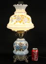 PORCELAIN AND OVERLAY GLASS LAMP WITH GILT BASE