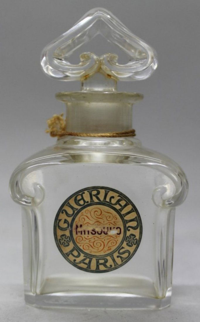 ANTIQUE GUERLAIN BACCARAT CRYSTAL FRENCH BOTTLE W/ TOP: RARE ANTIQUE GUERLAIN SIGNED BACCARAT CRYSTAL FRENCH ART DECO PERFUME BREAD SHAPED BOTTLE WITH TOP. MEASURES H: 5" SHIPPING AND HANDLING TO 48 STATES OF UNITED STATES: $45 INTERNATIONAL, ALASKA, HAWAI