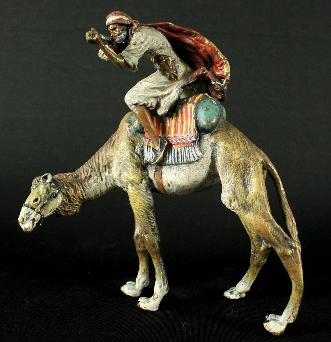 VIENNESE ENAMEL BERGMAN COLD PAINTED BRONZE BEDOUIN: ANTIQUE 1920'S MINIATURE SIGNED FRANZ BERGMAN VIENNESE ENAMEL VIENNA AUSTRIAN COLD PAINTED BRONZE HAND PAINTED BEDOUIN ARAB MAN ON CAMEL. MEASURES H: 6 3/4" SHIPPING AND HANDLING TO 48 STATES OF UNITE
