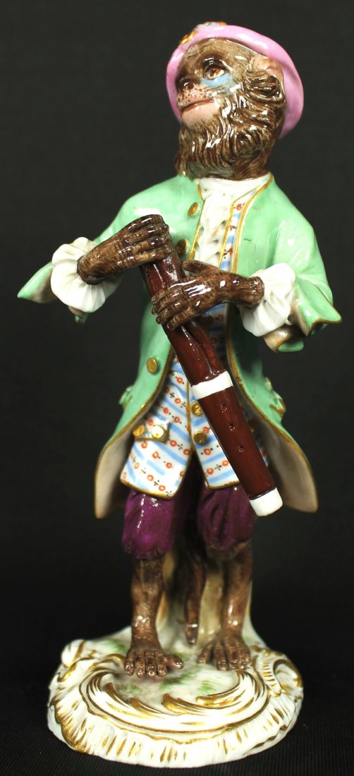 Meissen Monkey Porcelin Figure: Meissen Monkey Porcelin Figure. Measures H: 5 1/4", The monkey band was introduced by Meissen in mid 18th century, became extremely popular, and was reproduced by Meissen ever since .