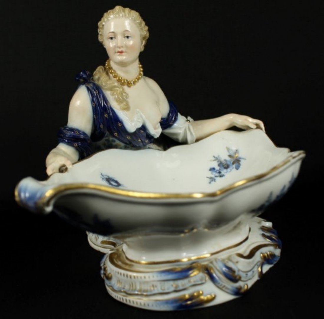 Meissen Porcelain Figural Sweetmeat Dish: semi-nude lady, cobalt & gold floral trim, crossed swords mark, 13" long, 6 3/4" tall, excellent.