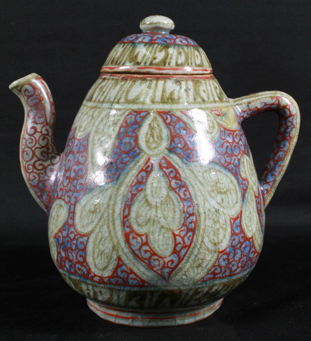 ANTIQUE MIDDLE EASTERN TEAPOT: ANTIQUE MIDDLE EASTERN TEAPOT. MEASURES H: 2 3/4" W: 7"
