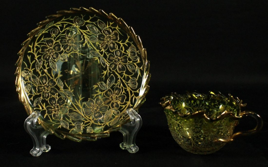 MOSER DECORATED CUP AND SAUCER: MOSER DECORATED CUP AND SAUCER. THE CUP MEASURES H: 1 3/4" AND THE SAUCER MEASURES 3 1/2" DIAMETER