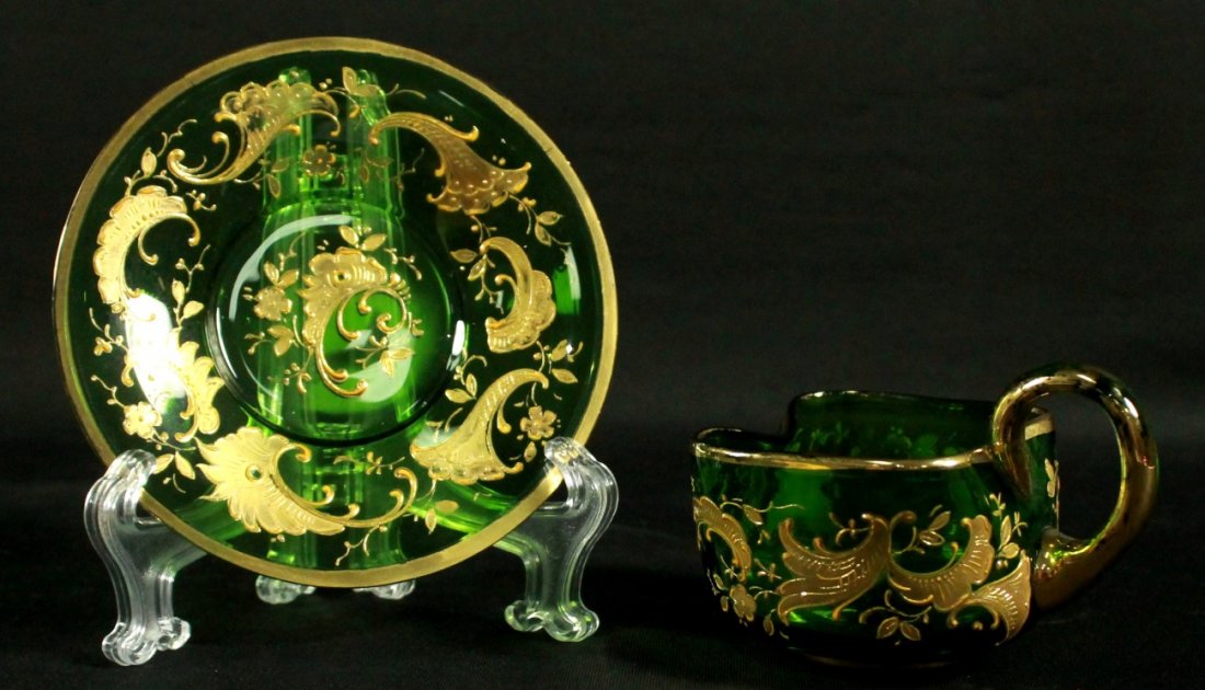 MOSER DECORATED CUP AND SAUCER: MOSER DECORATED CUP AND SAUCER. THE CUP MEASURES H: 2 1/4" AND THE SAUCER MEASURES 3 1/4" DIAMETER