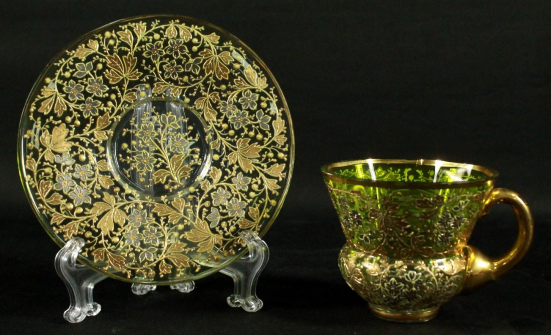 MOSER DECORATED CUP AND SAUCER: MOSER DECORATED CUP AND SAUCER. THE CUP MEASURES H: 2 3/4" AND THE SAUCER MEASURES 4 1/4" DIAMETER