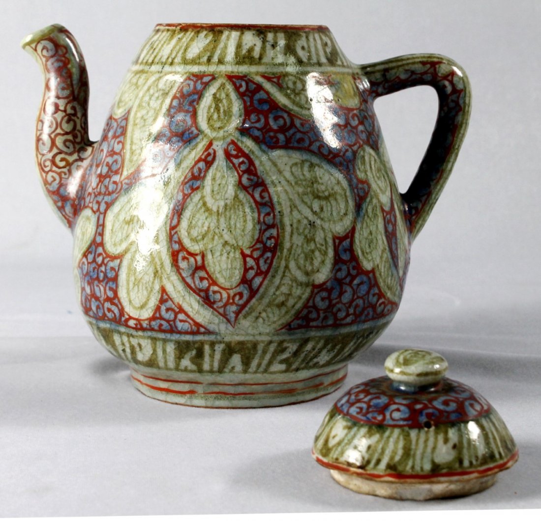 ANTIQUE MIDDLE EASTERN TEAPOT: ANTIQUE MIDDLE EASTERN TEAPOT. MEASURES 2 3/4" X 7"